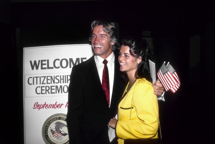 Arnold Schwarzenegger poses with then-girlfriend Maria Shriver after becoming a U.S. citizen on Sept. 17, 1983, in Los Angeles.